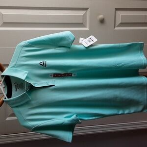 Men's Reebok performance polo shirt size medium.